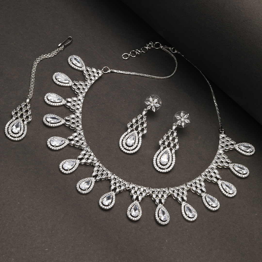 Glowing Droplet Necklace of White Colour with Earrings.