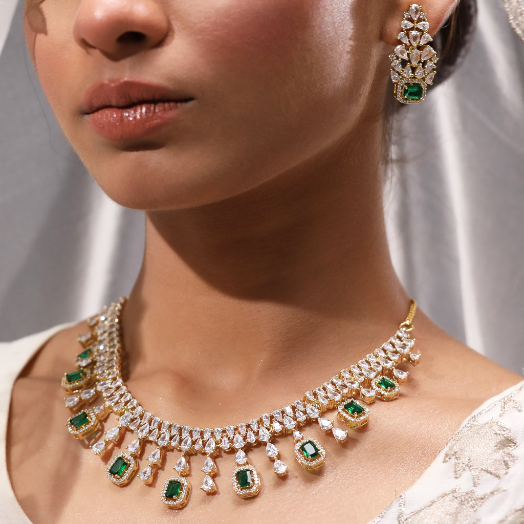 A woman wearing Dreamy Droplets Necklace of Green Color.