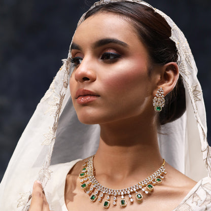 A woman wearing Dreamy Droplets Necklace of Green Color.