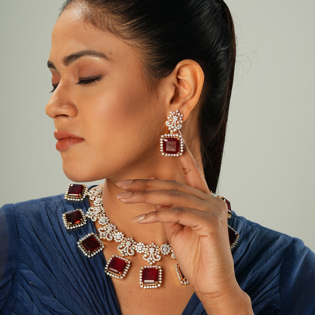 A woman wearing Eternal Grace Necklace Set of Red Colour with Earrings.