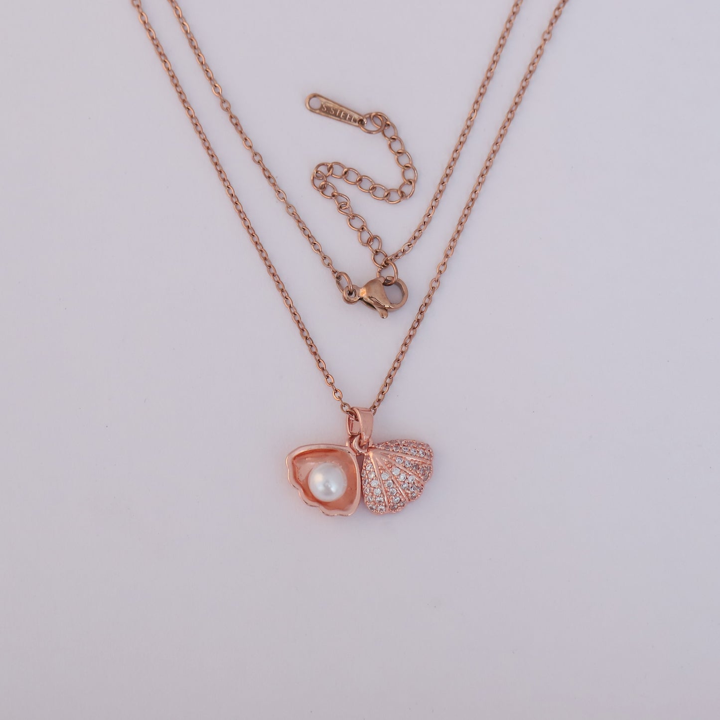 Sparkling Rose Gold Seashell Pendant with Pearl