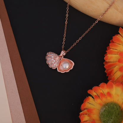 Sparkling Rose Gold Seashell Pendant with Pearl